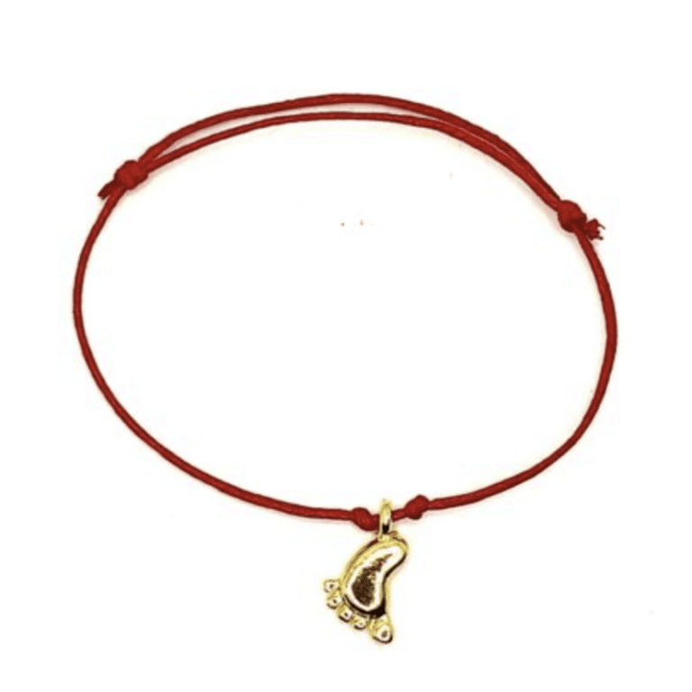 Khám phá vòng tay chỉ đỏ charm vàng: biểu tượng may mắn và tài lộc
