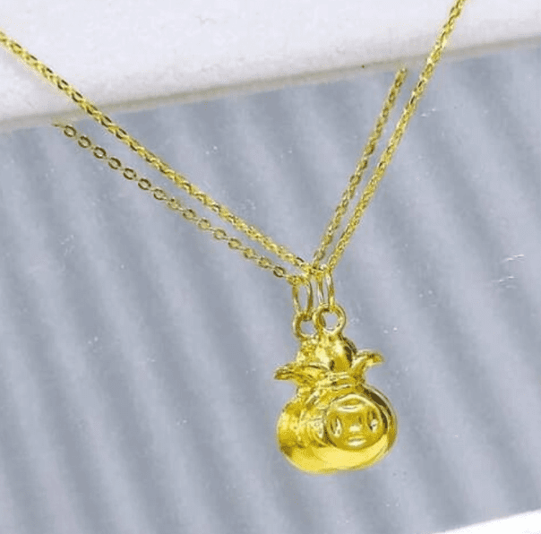 Mặt dây chuyền túi tiền thể hiện ước vọng về tài lộc và vận may