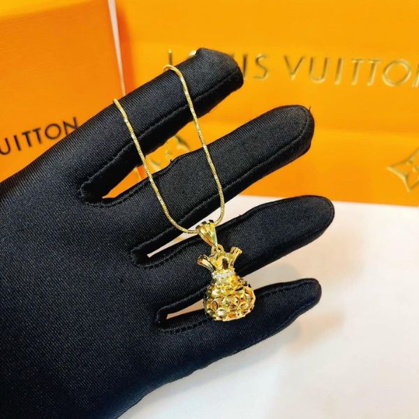 Mặt dây chuyền hình túi tiền bằng vàng