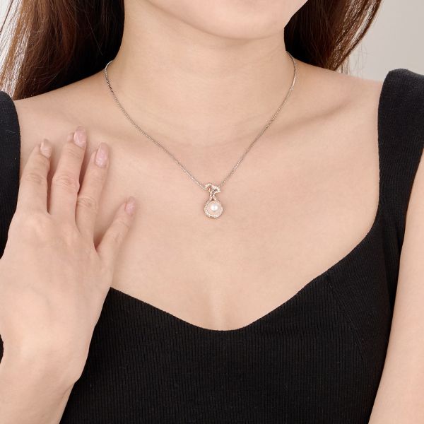 Mặt dây chuyền hình túi tiền bằng vàng